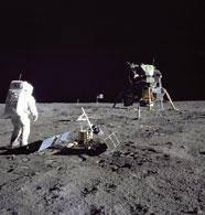Placing a seismometer on the moon during the Apollo 11 mission.